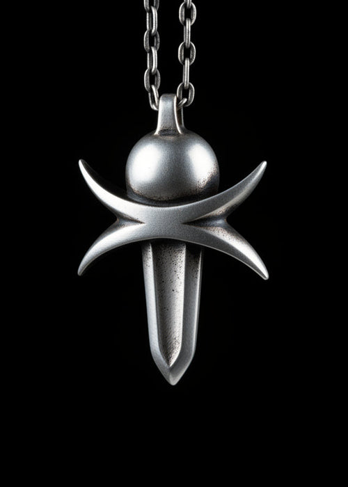 Silver pendant necklace on a black background